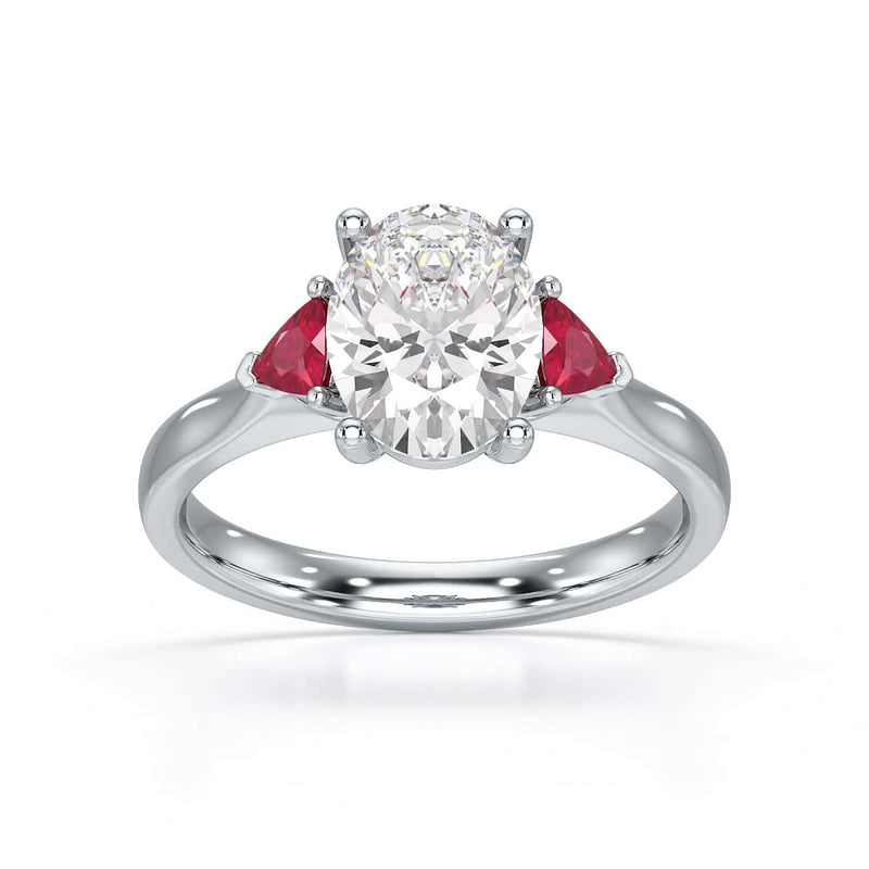 Oval trilogy engagement ring with trillion shape ruby