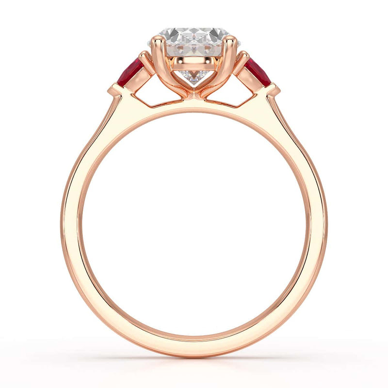 Oval trilogy engagement ring with trillion shape ruby