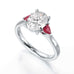 Oval trilogy engagement ring with trillion shape ruby