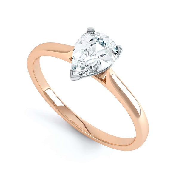 Diamond Solitaire Engagement Ring with Pear Shape Diamond and tapered point shoulders