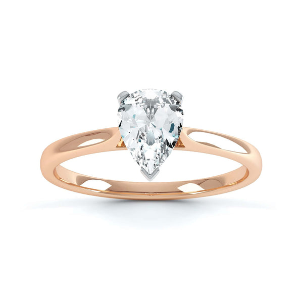 Diamond Solitaire Engagement Ring with Pear Shape Diamond and tapered point shoulders