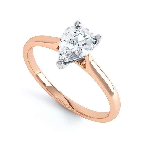 Diamond Solitaire Engagement Ring with a Pear Shape Diamond and Tapered Shoulders