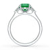 Platinum Emerald oval center with trillion shaped diamonds Engagement  ring
