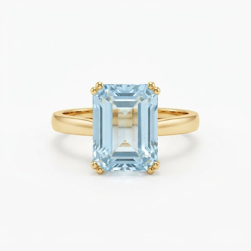 Emerald-Cut Aquamarine Solitaire Ring in Yellow Gold