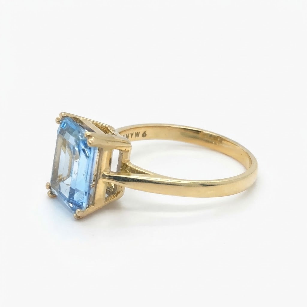 Emerald-Cut Aquamarine Solitaire Ring in Yellow Gold