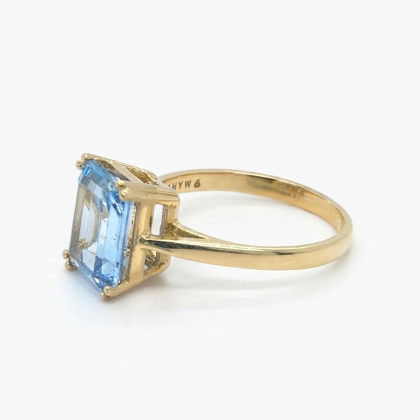 Emerald-Cut Aquamarine Solitaire Ring in Yellow Gold