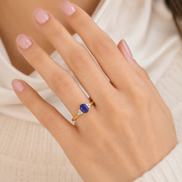 Oval Shape Blue Sapphire Trefoil Diamond Engagement Ring in 18ct Gold and Platinum