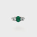 Oval Emerald and round natural diamond white gold ring