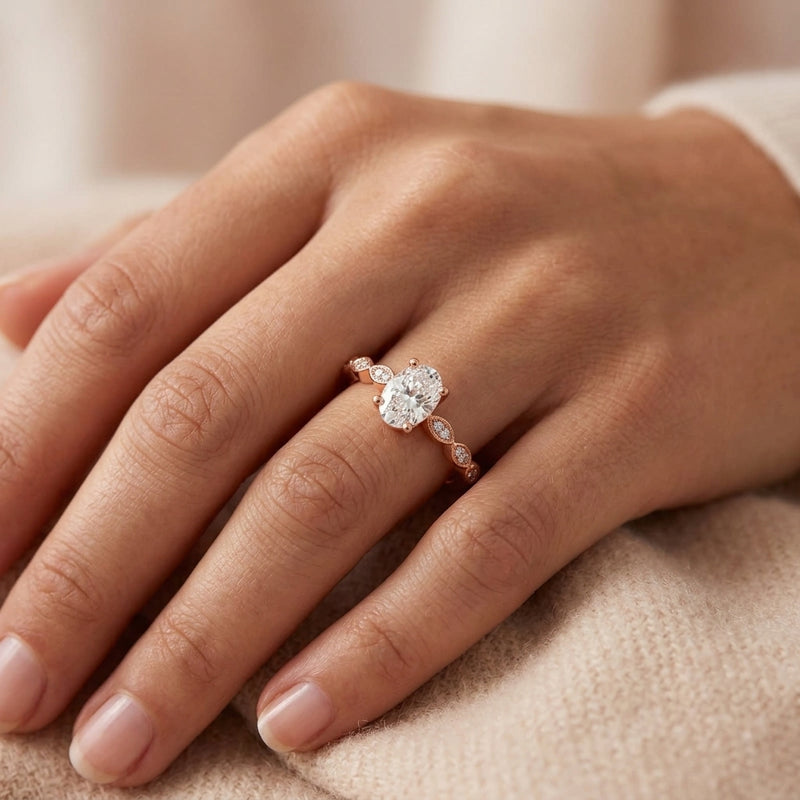 Oval centre Engagement Ring with Marquise Shape Shoulders with diamonds