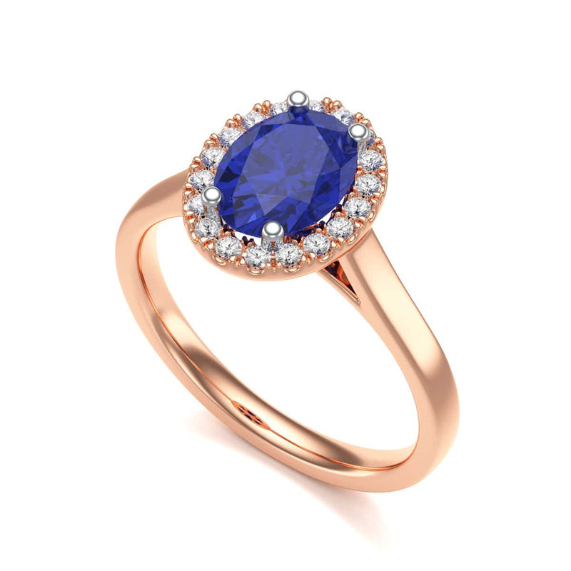 Diamond Halo Oval Shape Blue Sapphire Engagement Ring in 18ct Gold and Platinum
