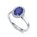 Diamond Halo Oval Shape Blue Sapphire Engagement Ring in 18ct Gold and Platinum