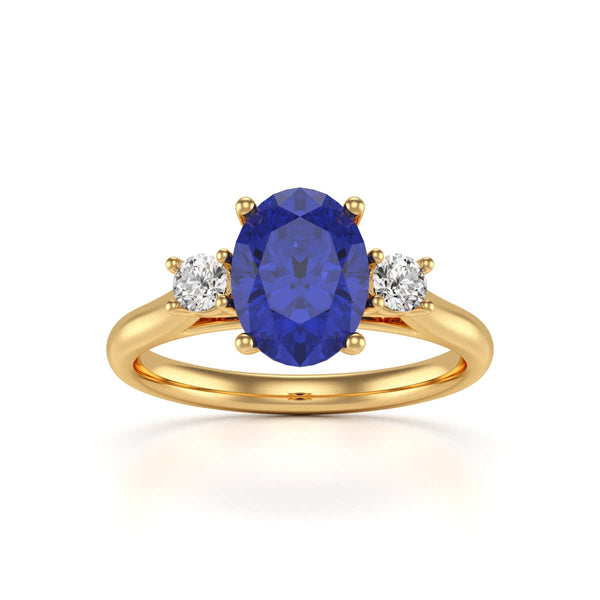 Oval Shape Trilogy Blue Sapphire Engagement Ring in 18ct Gold and Platinum
