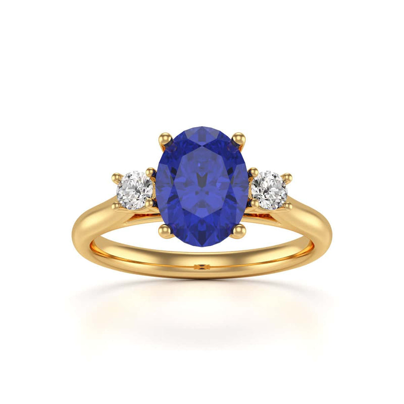 Oval Shape Trilogy Blue Sapphire Engagement Ring in 18ct Gold and Platinum
