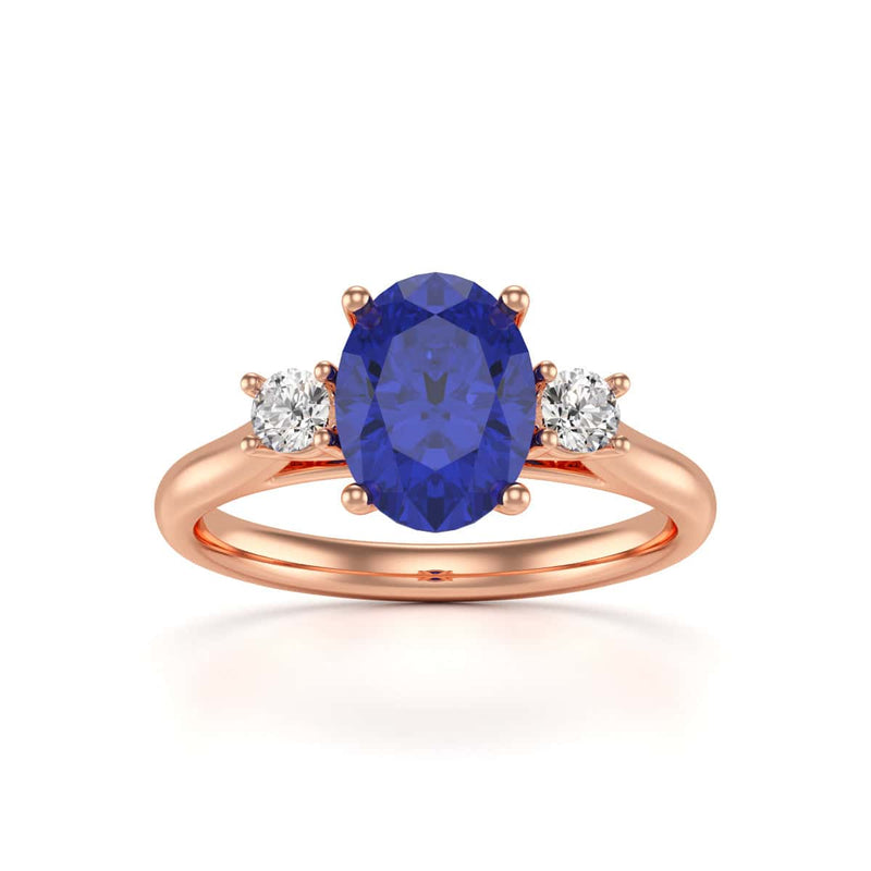 Oval Shape Trilogy Blue Sapphire Engagement Ring in 18ct Gold and Platinum