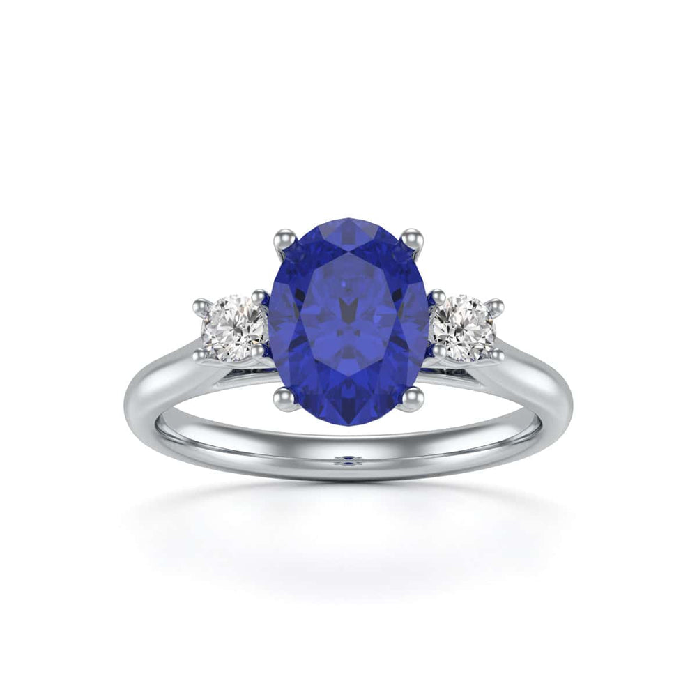 Oval Shape Trilogy Blue Sapphire Engagement Ring in 18ct Gold and Platinum