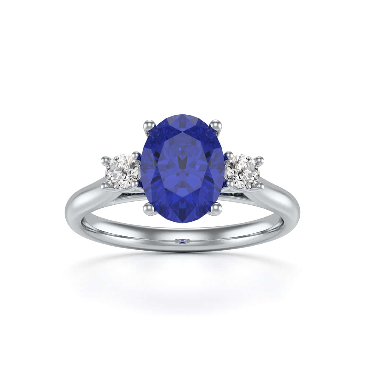 Blue Sapphire Oval Trilogy Ring with Diamond Side Stones