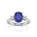 Oval Shape Trilogy Blue Sapphire Engagement Ring in 18ct Gold and Platinum