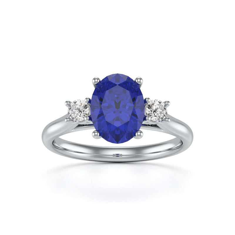 Oval Shape Trilogy Blue Sapphire Engagement Ring in 18ct Gold and Platinum