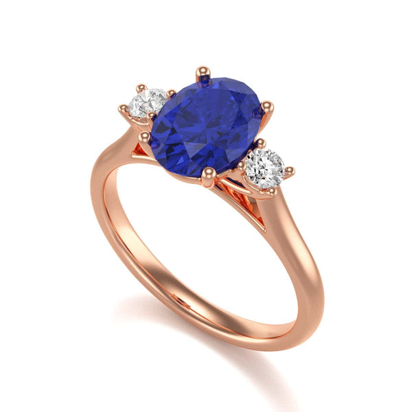 Oval Shape Trilogy Blue Sapphire Engagement Ring in 18ct Gold and Platinum