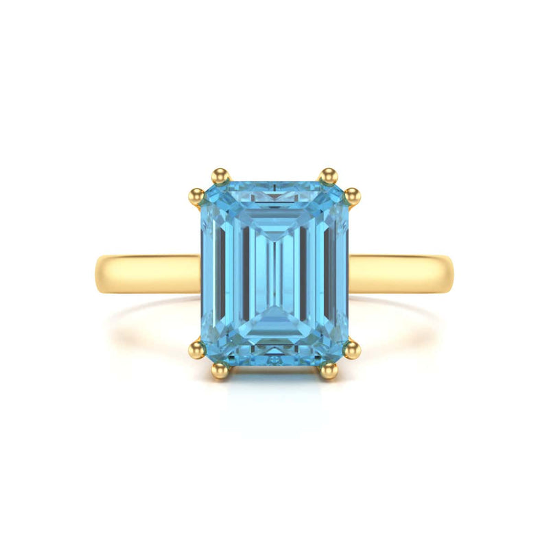 Emerald Cut Blue Topaz Solitaire Dress Ring