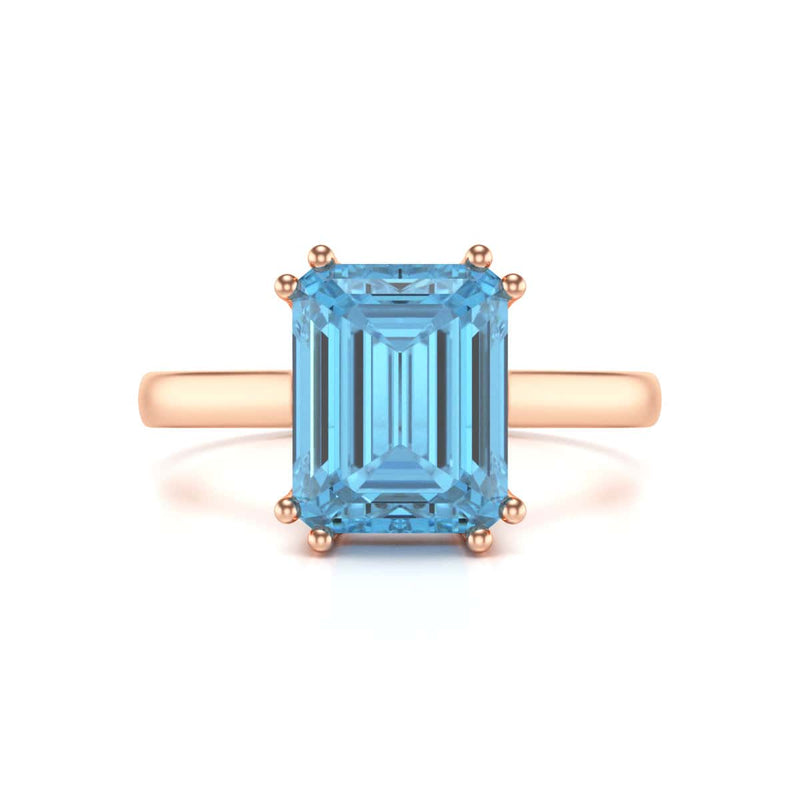 Emerald Cut Blue Topaz Solitaire Dress Ring