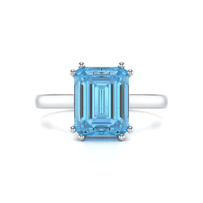 Emerald Cut Blue Topaz Solitaire Dress Ring