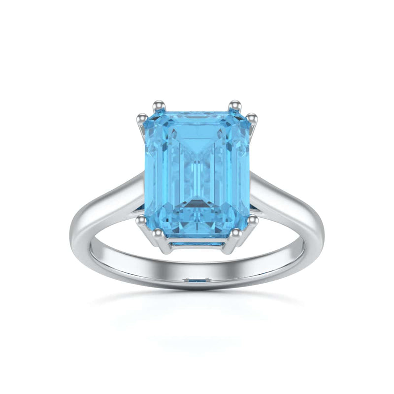 Emerald Cut Blue Topaz Solitaire Dress Ring