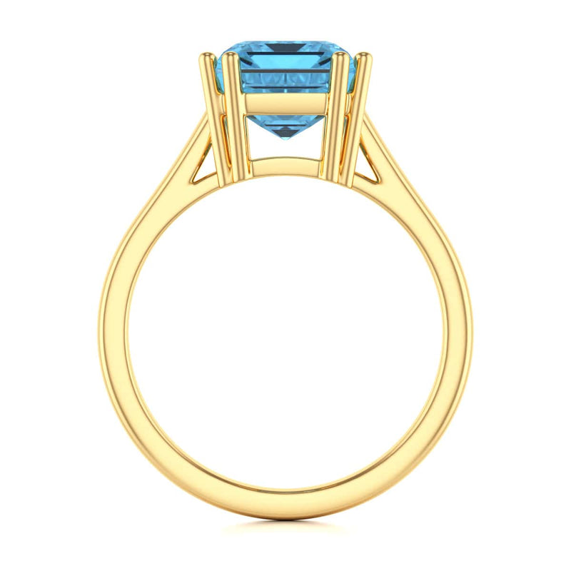 Emerald Cut Blue Topaz Solitaire Dress Ring