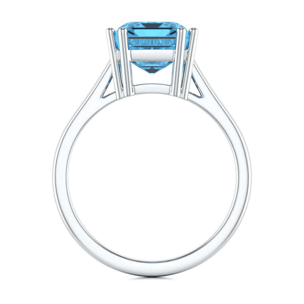 Emerald Cut Blue Topaz Solitaire Dress Ring